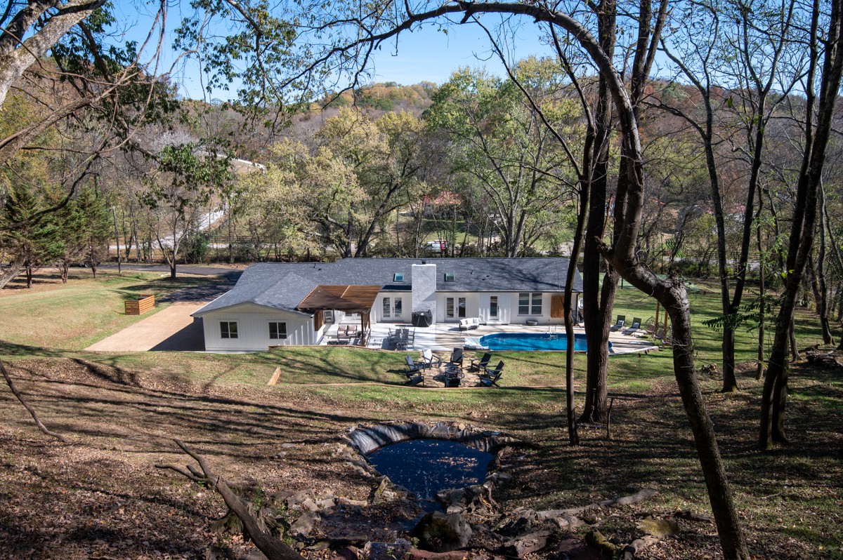 270 Hurt Road Hendersonville, TN 37075 - Photo 60 of 68 a backyard of a house with barbeque oven and outdoor seating