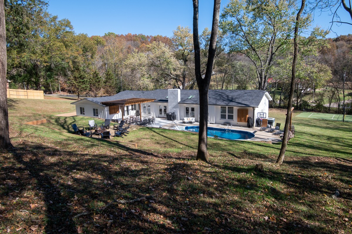 270 Hurt Road Hendersonville, TN 37075 - Photo 61 of 68 a view of a house with backyard and a tree