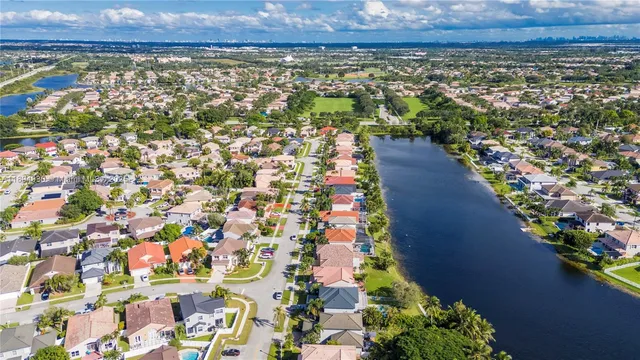a view of a swimming pool with a patio