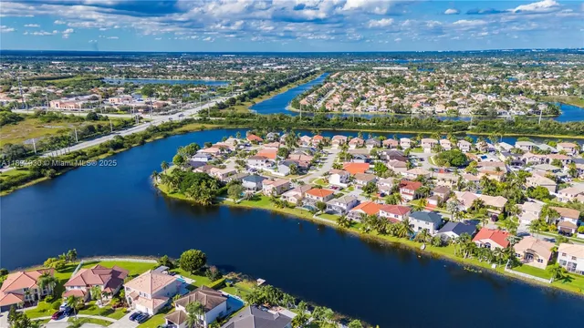 front view of a house with a swimming pool