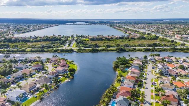 a view of outdoor space with sign board and garden