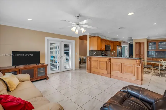 a bedroom with a bed and cabinets