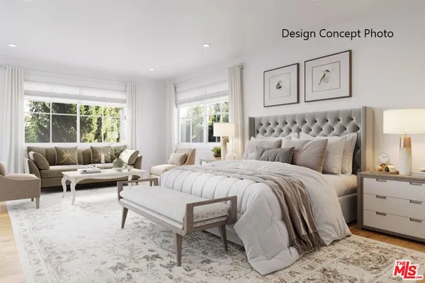 a bedroom with a bed and a couch