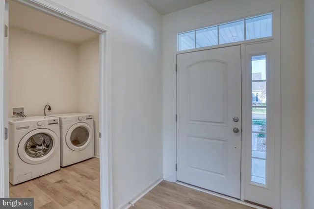 a utility room with dryer and washer