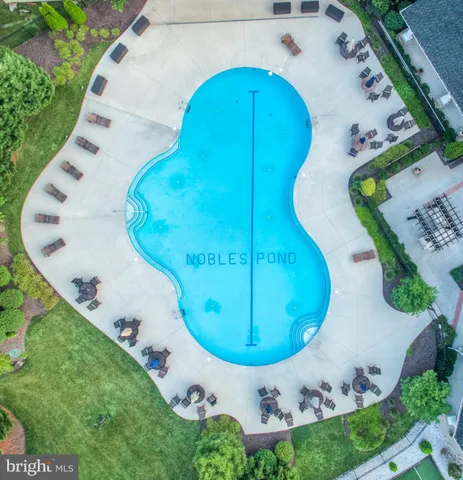 an aerial view of a swimming pool