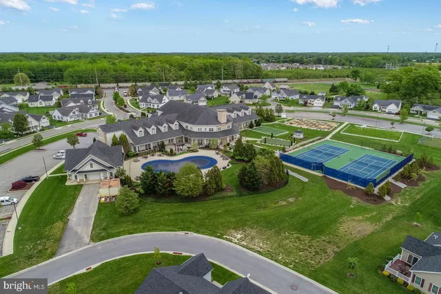 an aerial view of a house with a garden