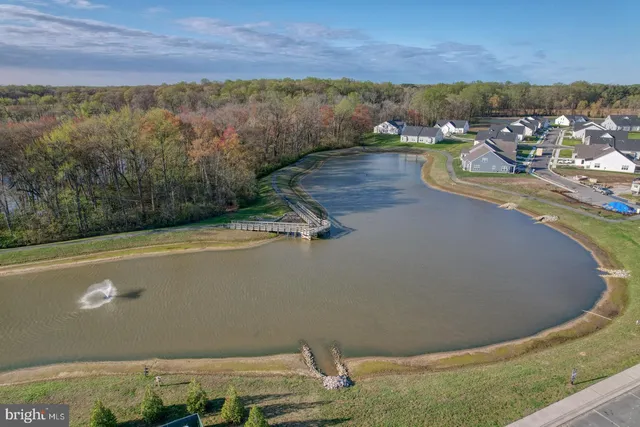 a view of a lake in middle of the house