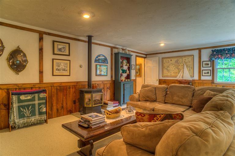 1136 Old Post Road Cotuit, MA 02635 - Photo 15 of 20 a living room with furniture and a window