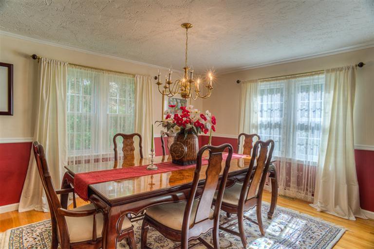 1136 Old Post Road Cotuit, MA 02635 - Photo 6 of 20 a view of a dining room with furniture window and wooden floor