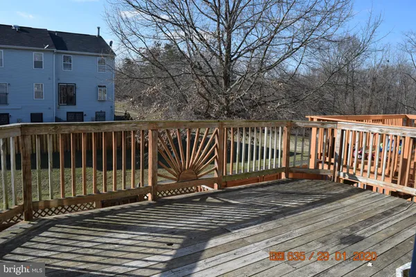 a view of a wooden roof deck