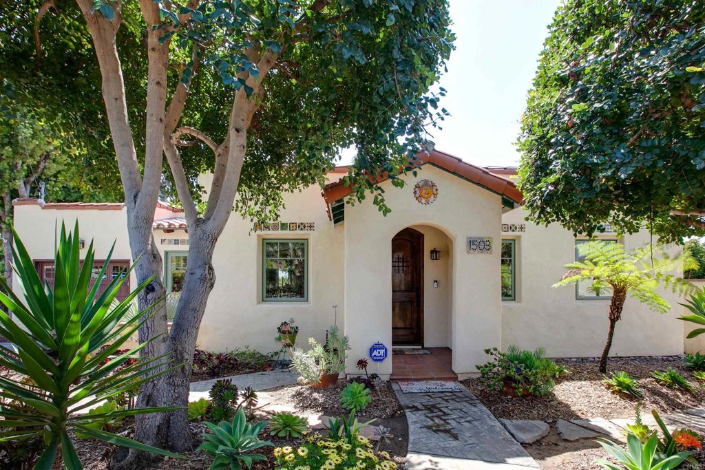 1503 Ridgeway Street Oceanside, CA 92054 - Photo 28 of 56 a front view of a house with garden
