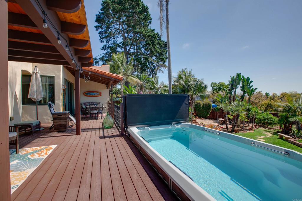 1503 Ridgeway Street Oceanside, CA 92054 - Photo 37 of 56 a view of balcony with wooden floor and potted plant