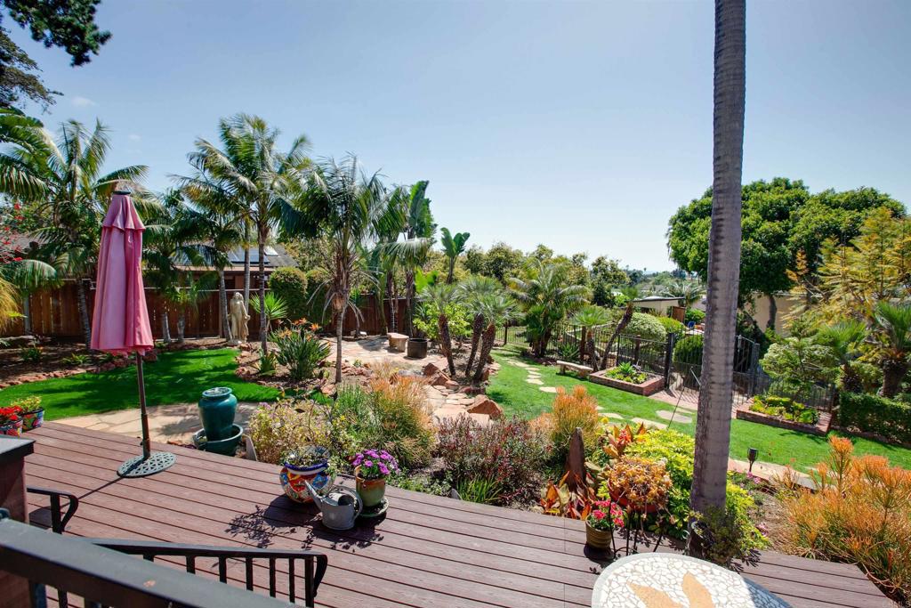 1503 Ridgeway Street Oceanside, CA 92054 - Photo 38 of 56 a view of a wooden chairs and table in the patio
