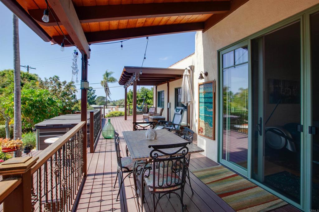 1503 Ridgeway Street Oceanside, CA 92054 - Photo 39 of 56 a view of a patio with a table and chairs
