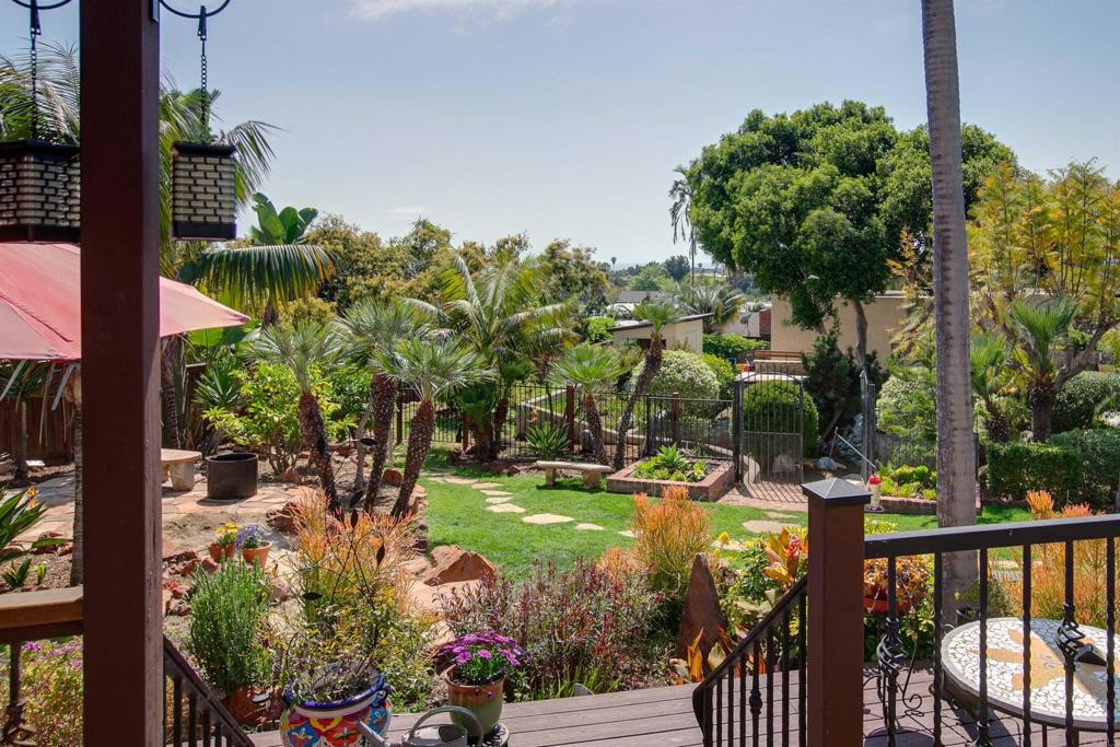 1503 Ridgeway Street Oceanside, CA 92054 - Photo 40 of 56 a view of a swimming pool with a patio and garden