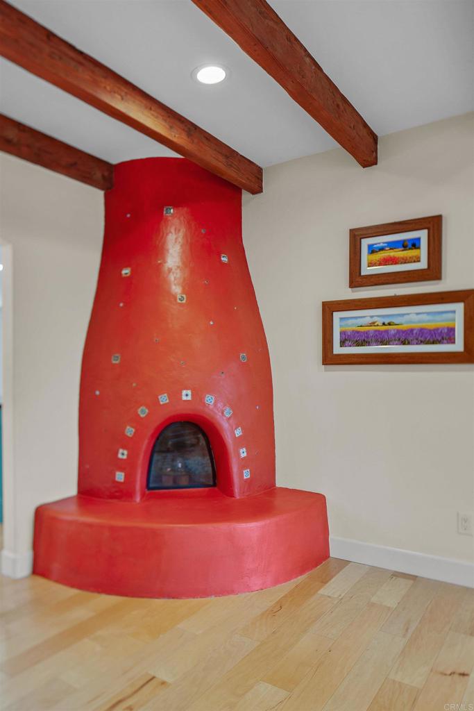 1503 Ridgeway Street Oceanside, CA 92054 - Photo 4 of 56 a bedroom with a bed and a painting on the wall