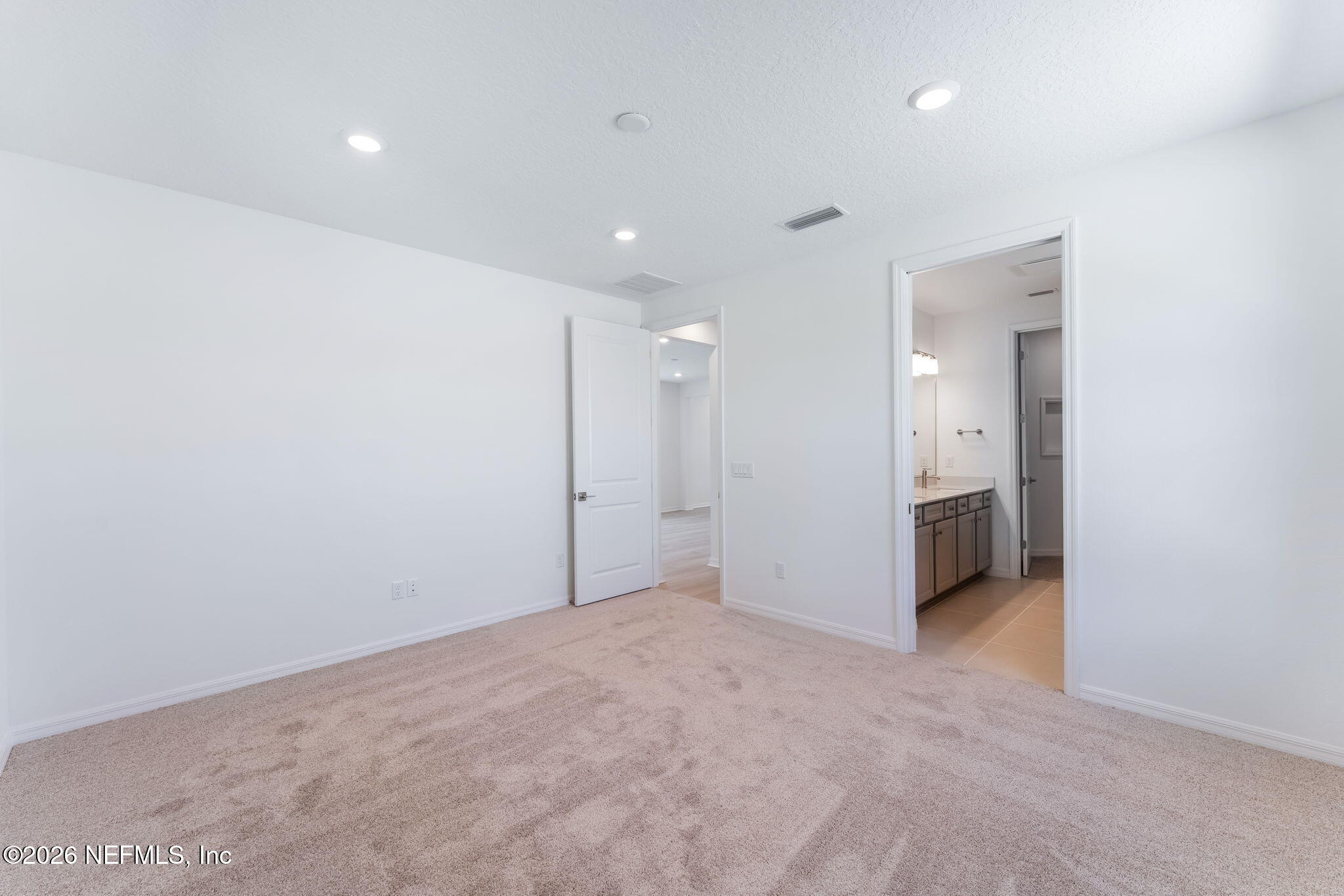 614 Ecliptic Loop Yulee, FL 32097 - Photo 23 of 60 25-web-or-mls-Primary Bedroom