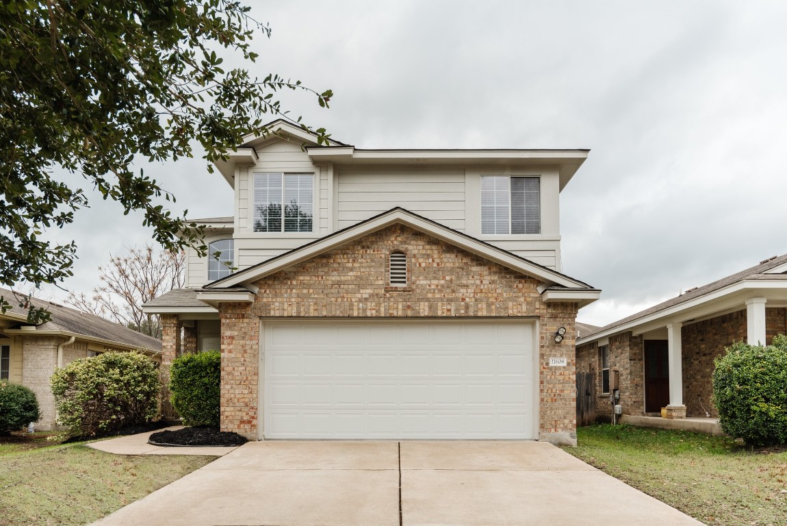 11608 Jim Thorpe Lane Austin, TX 78748 - Photo 1 of 40 front view of house with a yard