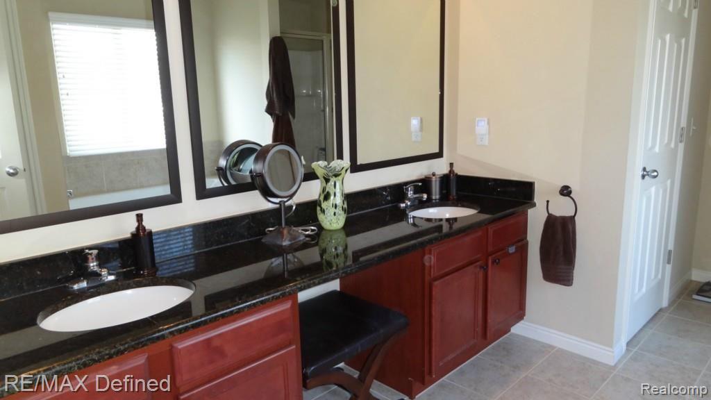 3254 Fantail Drive Rochester, MI 48309 - Photo 37 of 46 Master Bath - custom mirrors - granite top - (Water-closet to the right)