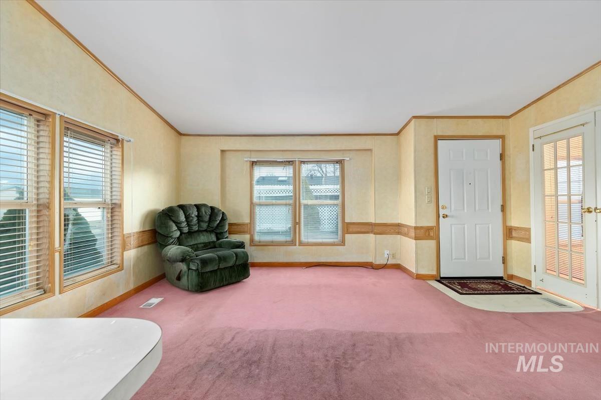2804 Golden Rod Lane Caldwell, ID 83605 - Photo 19 of 35 Sitting room with carpet and ornamental molding