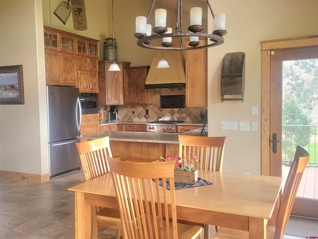 a view of a dining room with furniture