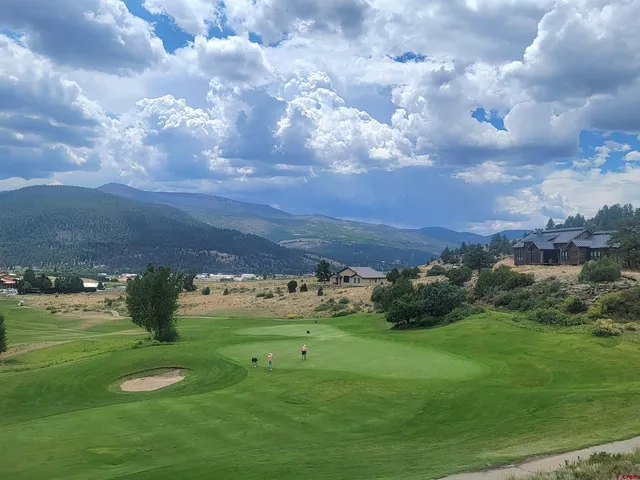 an empty room with a empty space and windows