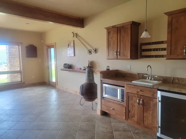 a bedroom with a bed and a table