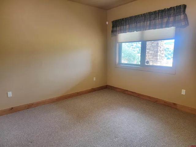 a front view of a house with yard