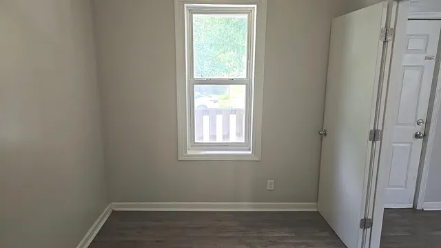 a view of an empty walk in closet