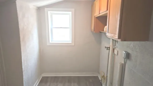 a bathroom with a bathtub and toilet