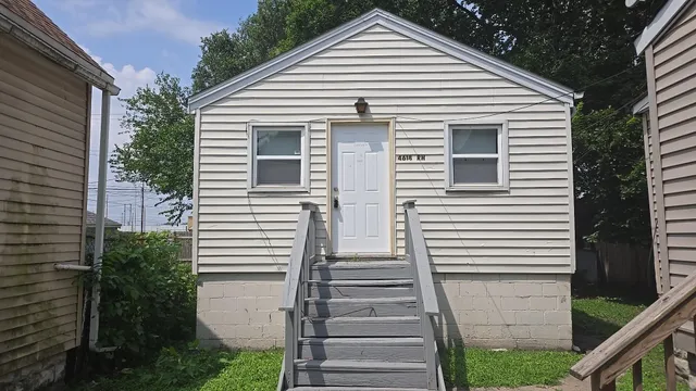 a view of a house with a street