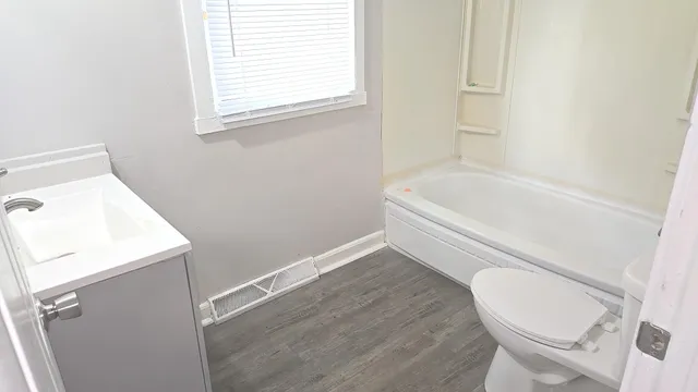 a view of livingroom with an empty space and window