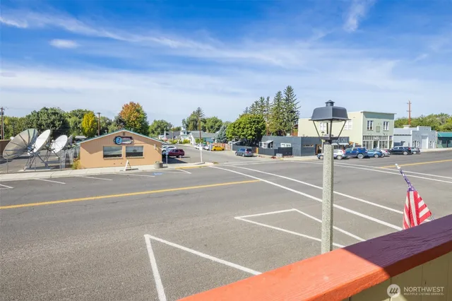 a view of a city street from a building