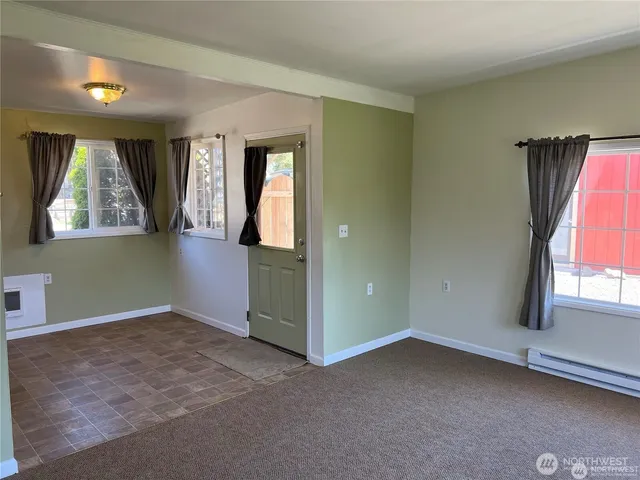 an empty room that has a window