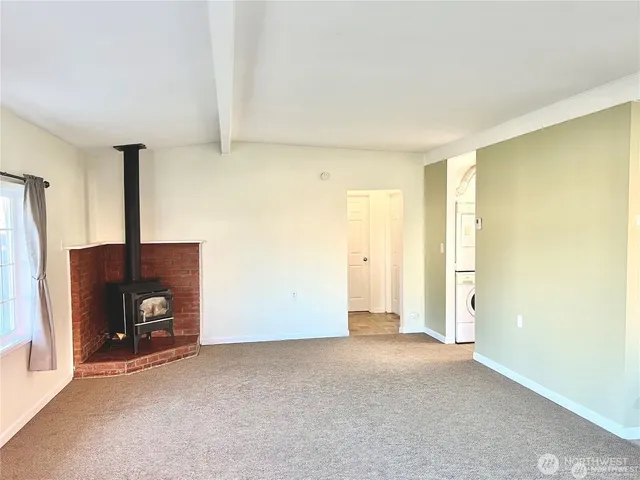 a kitchen with a refrigerator sink and stove