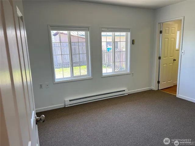 an empty room with a door