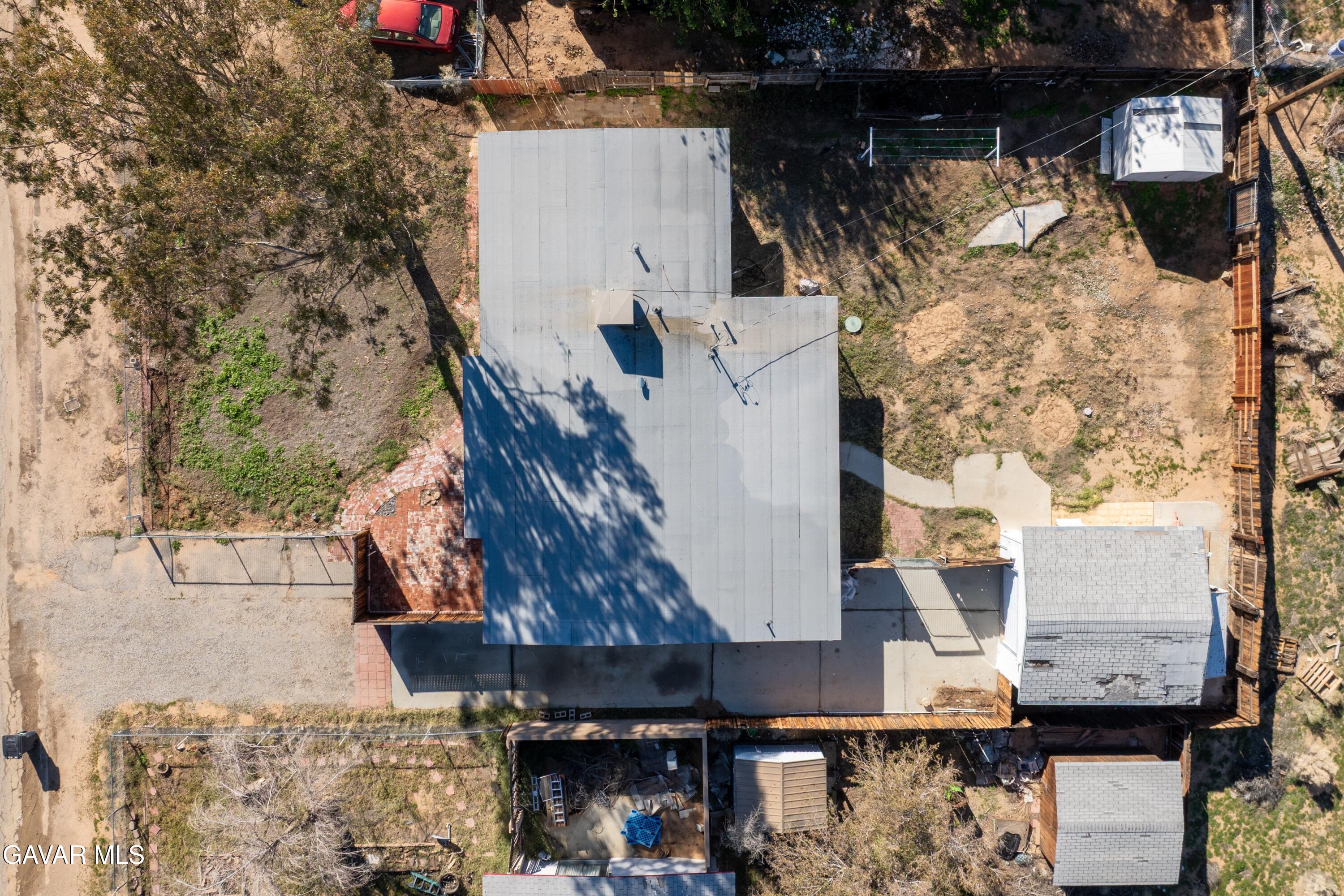 13445 Fran Street North Edwards, CA 93523 - Photo 22 of 27 a buildings covered with tall trees
