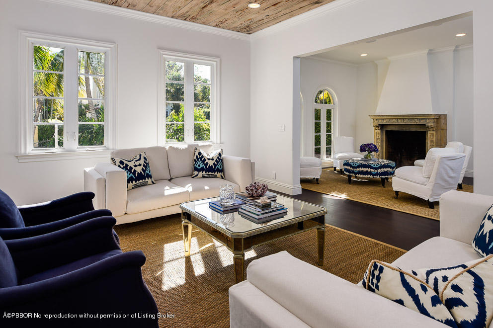 277 Cordova Road West Palm Beach, FL 33401 - Photo 2 of 18 a living room with furniture and a fireplace