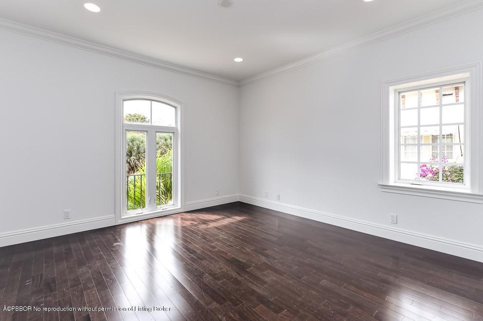 277 Cordova Road West Palm Beach, FL 33401 - Photo 13 of 18 an empty room with window & wooden floor