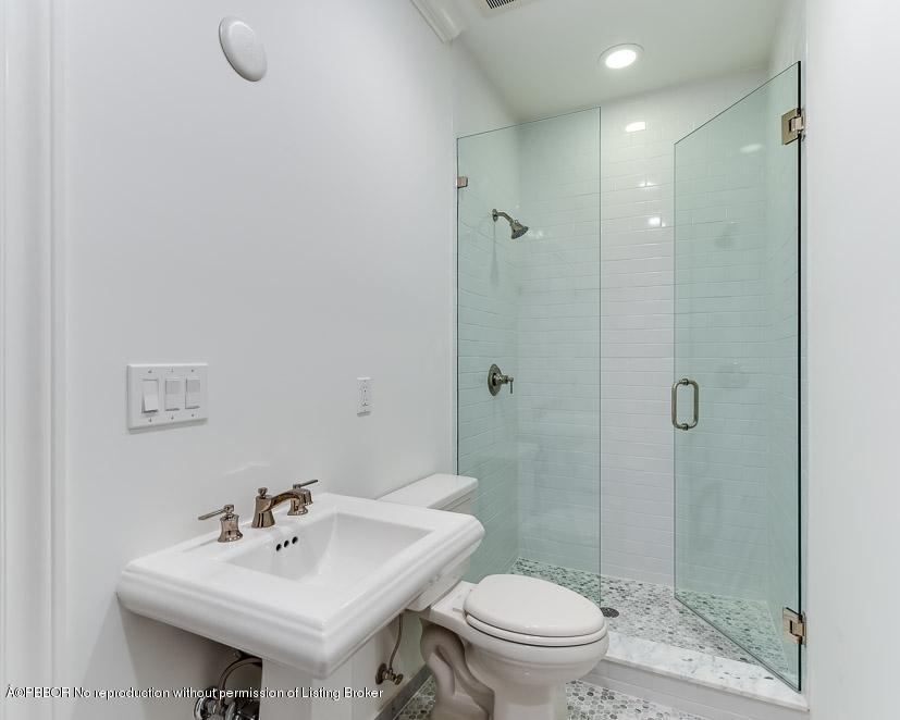 277 Cordova Road West Palm Beach, FL 33401 - Photo 16 of 18 a bathroom with a sink toilet and shower