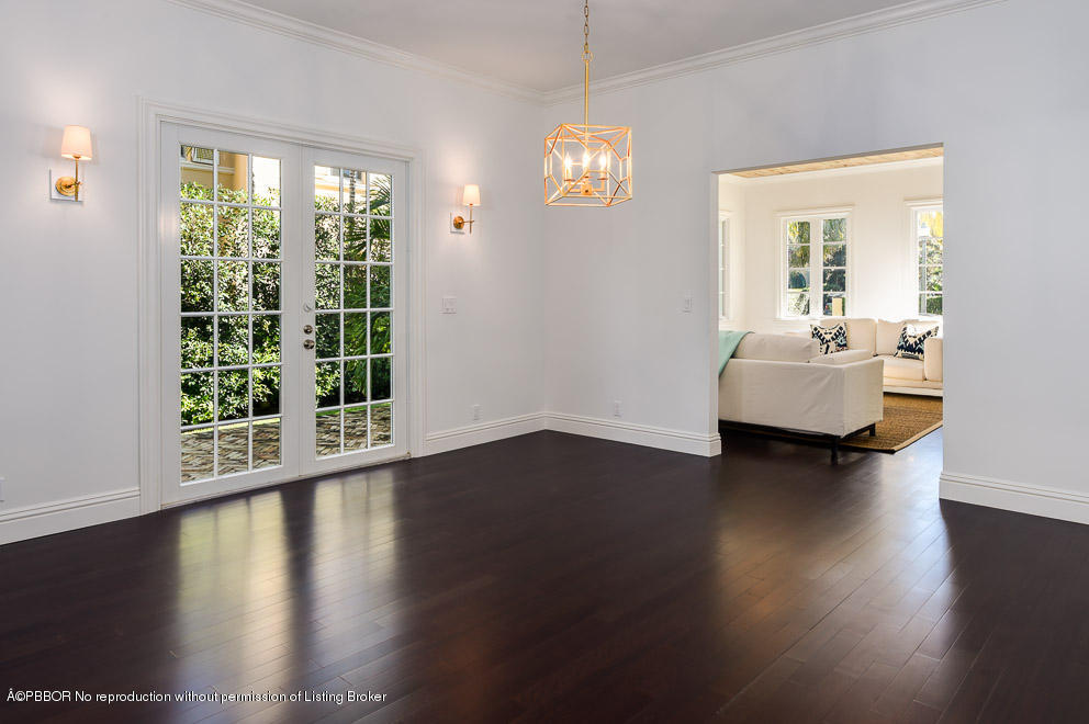 277 Cordova Road West Palm Beach, FL 33401 - Photo 5 of 18 a view of a livingroom with furniture wooden floor and a window
