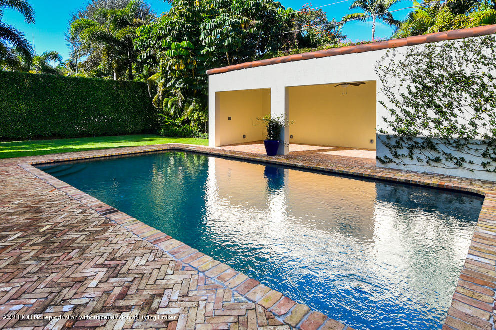 277 Cordova Road West Palm Beach, FL 33401 - Photo 10 of 18 a view of a swimming pool with a yard