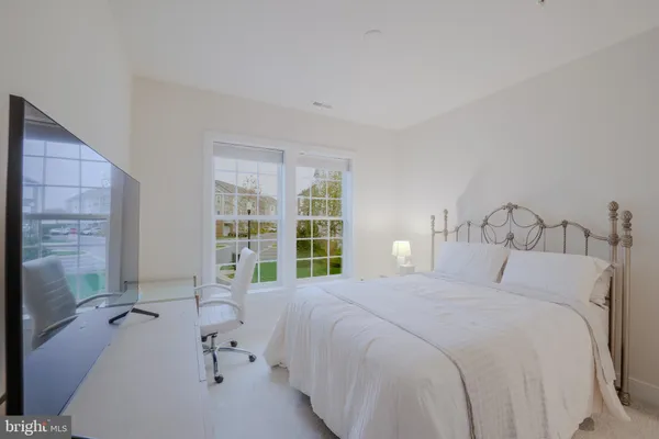 a bathroom with a double vanity sink and mirror