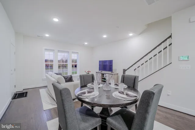 a bathroom with a sink toilet and a mirror