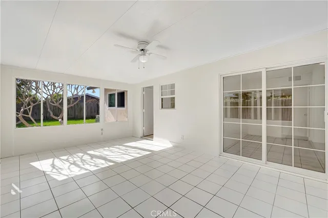 a view of an empty room with a large window
