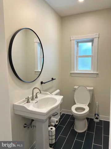 a room with a bed and a window