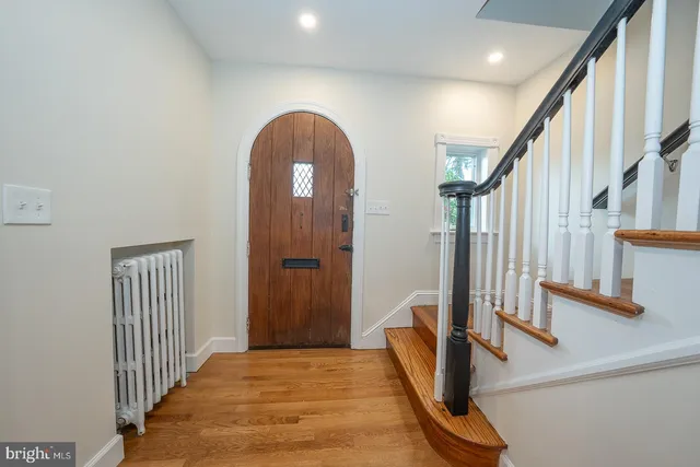 a room with a bed and a window