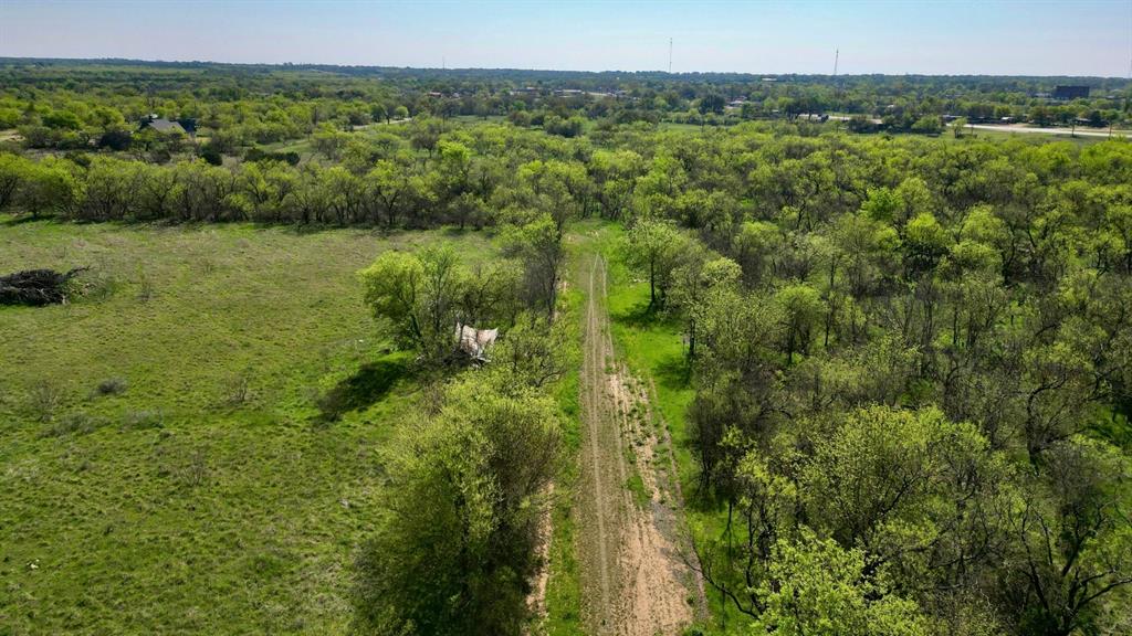 Tbd North Tiffin Road Ranger, TX 76470 - Photo 4 of 6 a view of a green field with lots of trees