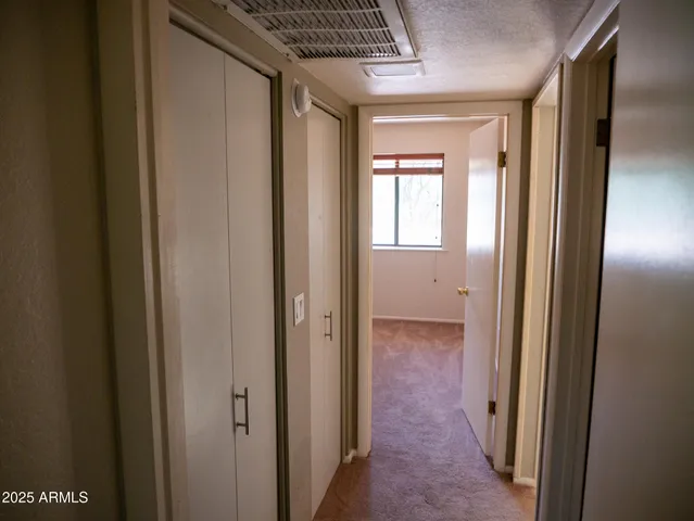 a view of a room that has a large window