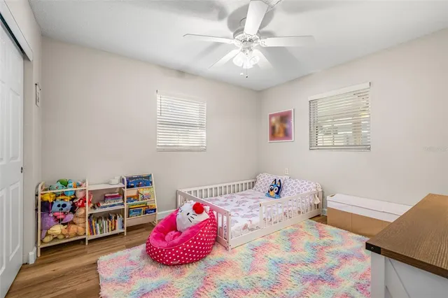 a bedroom with a bed and dresser
